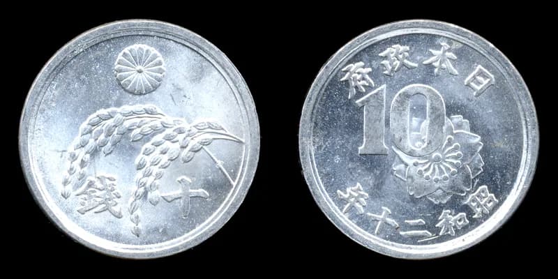 鳳凰100円銀貨の表裏。表面には鳳凰、裏面には桐と100の文字が刻まれている。